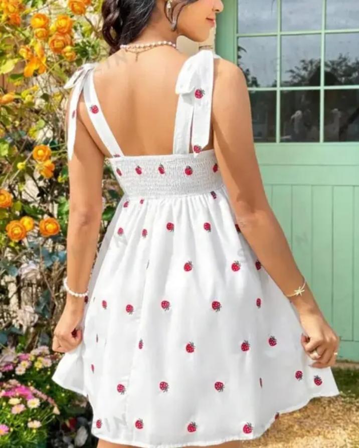 White Sleeveless A-Line Dress with Red Strawberry Print & Tie-Up Straps" 🍓✨